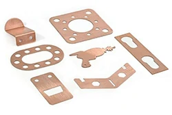 Детали из листового металла, вырезанные лазером из меди.