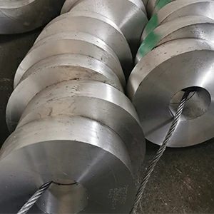 Aluminum discs with center holes for bearing seats and flanges